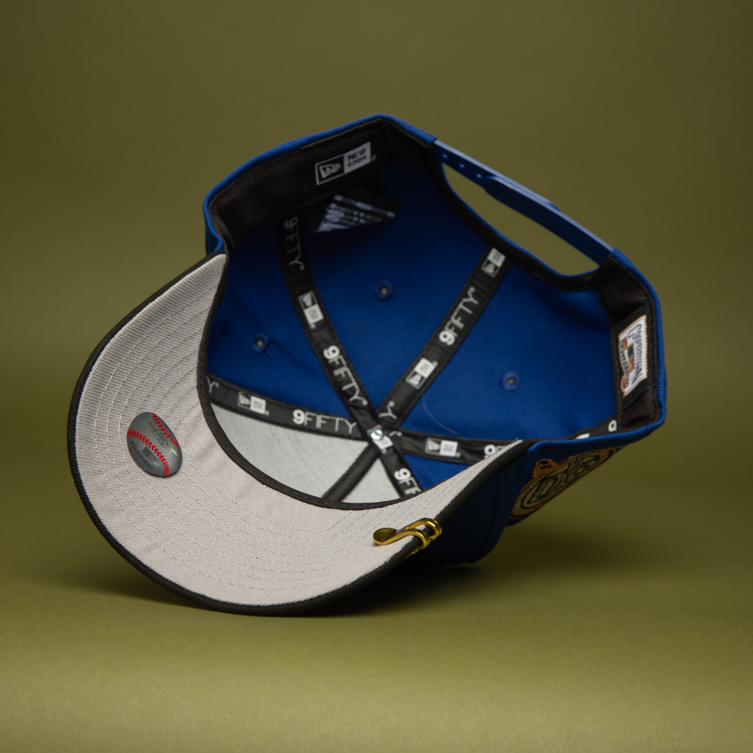 NEW ERA 9FIFTY A-FRAME BLUE/BLACK ANAHEIM ANGELS SNAPBACK W/ 50TH ANNIVERSARY SIDE PATCH