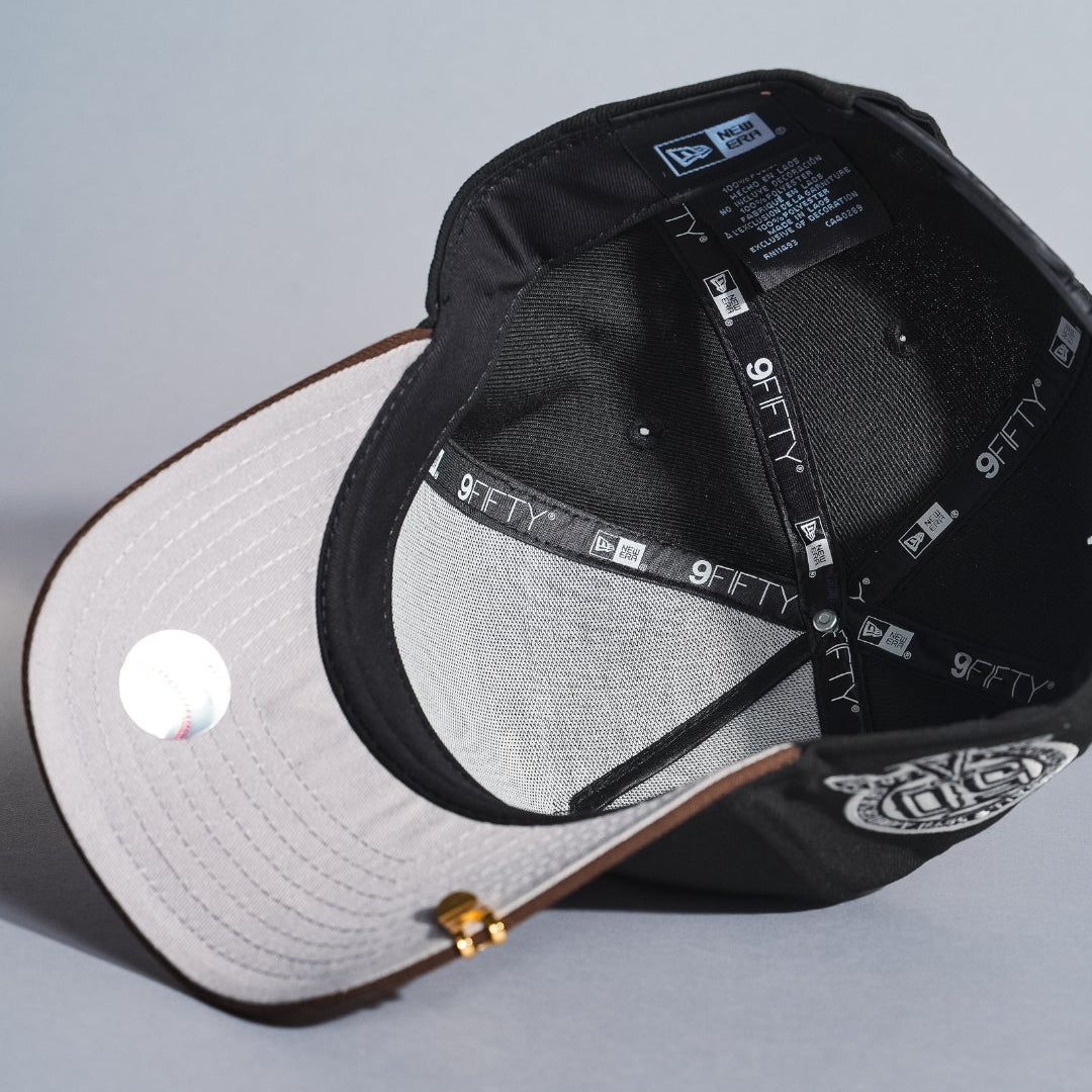 NEW ERA 9FIFTY A-FRAME BLACK/BROWN UPSIDE DOWN ANAHEIM ANGELS SNAPBACK W/ 50TH ANNIVERSARY SIDE PATCH