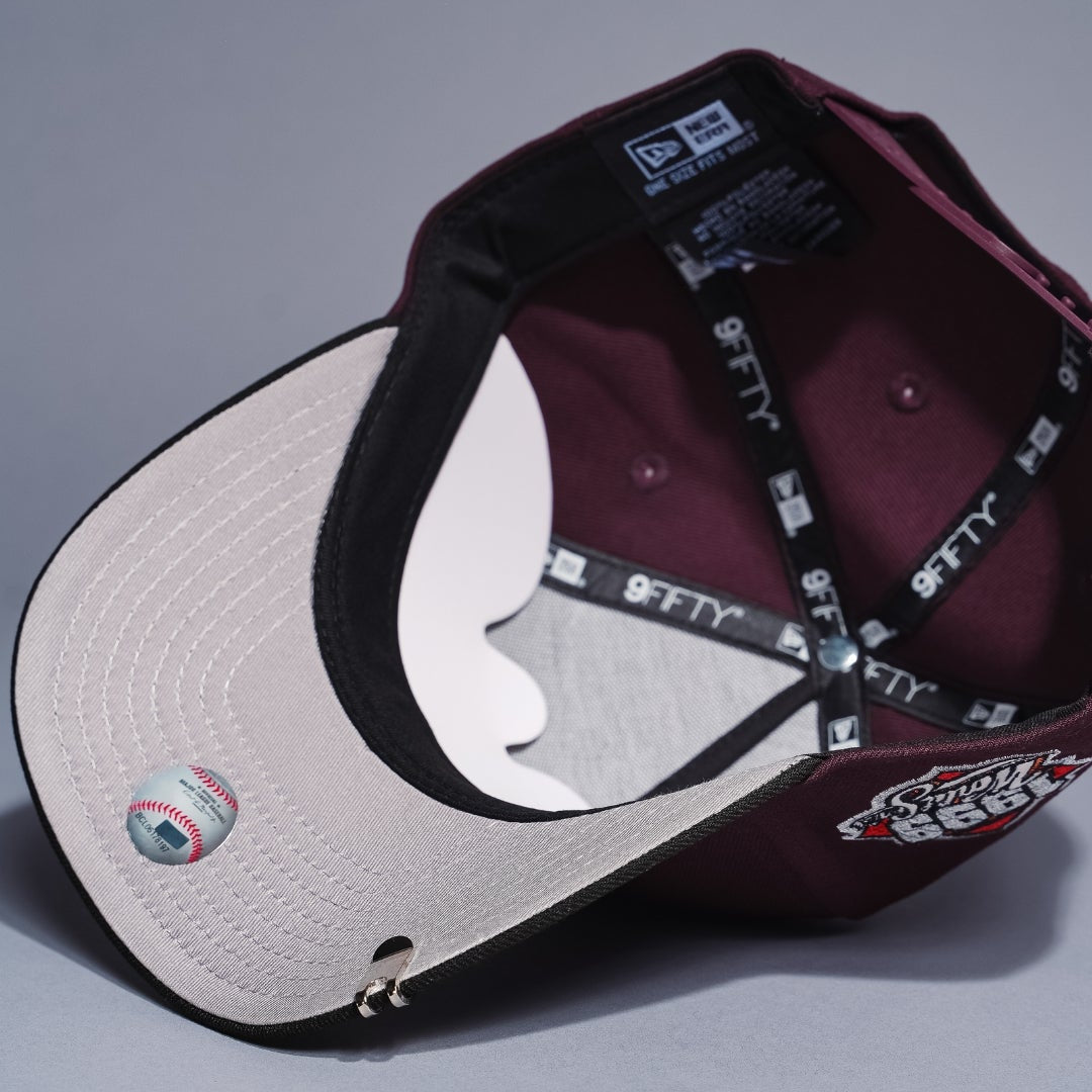 NEW ERA 9FIFTY A-FRAME BURGUNDY/BLACK ATLANTA BRAVES SNAPBACK W/ 1999 WORLD SERIES SIDE PATCH