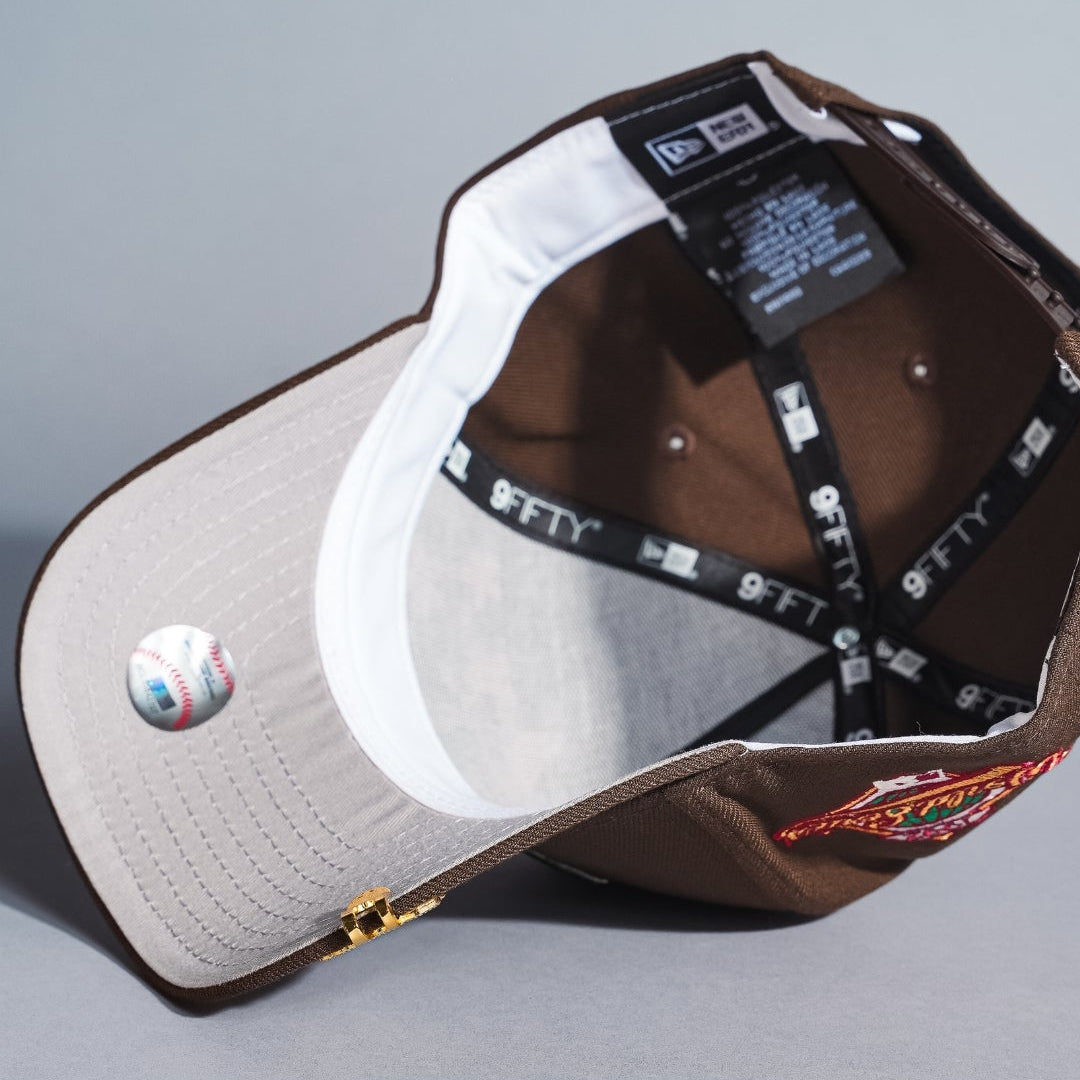 NEW ERA 9FIFTY A-FRAME BROWN TORONTO BLUE JAYS SNAPBACK W/ FLORAL EMBROIDERY + WORLD SERIES SIDE PATCH