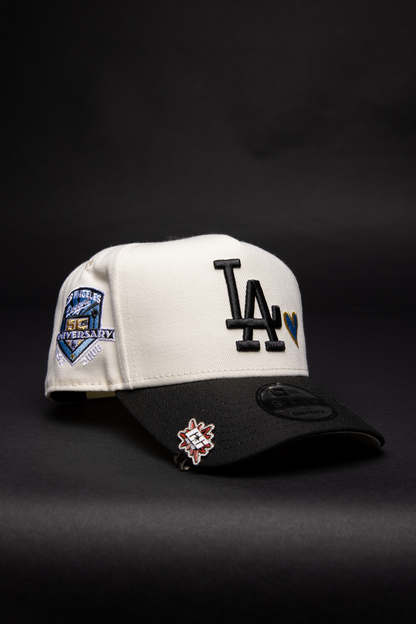 NEW ERA 9FIFTY A-FRAME CHROME/ BLACK LOS ANGELES DODGERS SNAPBACK W/ HEART + 50TH ANNIVERSARY SIDE PATCH