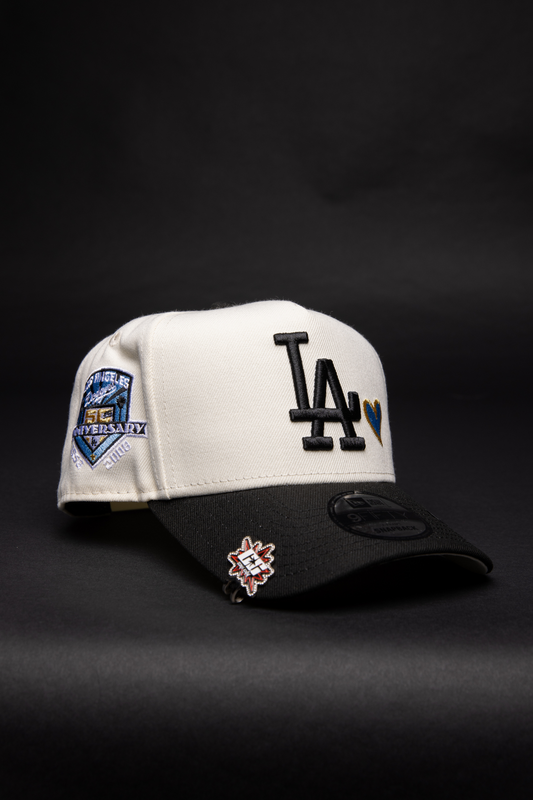 NEW ERA 9FIFTY A-FRAME CHROME/ BLACK LOS ANGELES DODGERS SNAPBACK W/ HEART + 50TH ANNIVERSARY SIDE PATCH