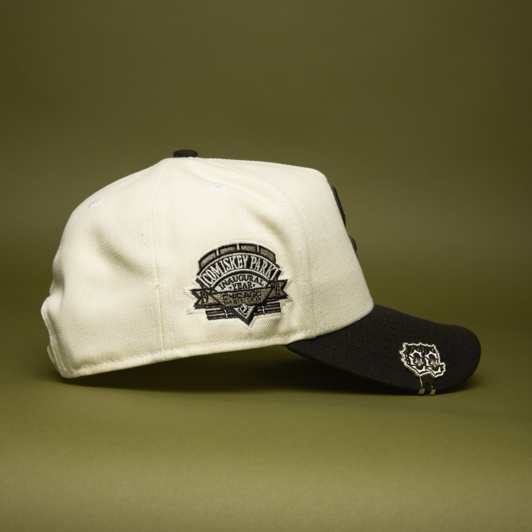 NEW ERA 9FIFTY A-FRAME CHROME/BLACK CHICAGO WHITE SOX SNAPBACK W/ COMISKEY PARK SIDE PATCH