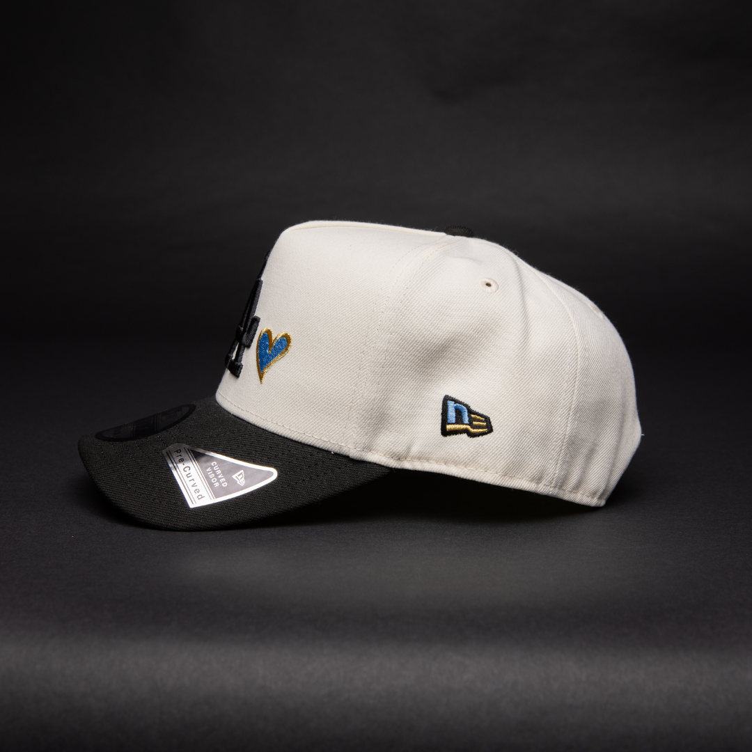 NEW ERA 9FIFTY A-FRAME CHROME/ BLACK LOS ANGELES DODGERS SNAPBACK W/ HEART + 50TH ANNIVERSARY SIDE PATCH