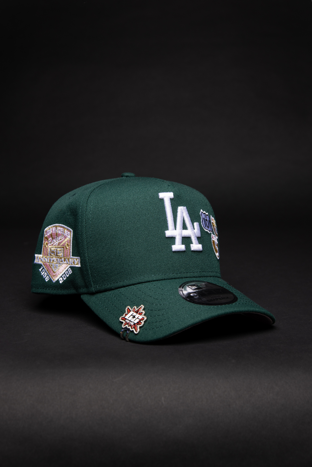 NEW ERA 9FIFTY A-FRAME FOREST GREEN LOS ANGELES DODGERS SNAPBACK W/ INTERSTATE + 50TH ANNIVERSARY SIDE PATCH