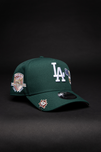 NEW ERA 9FIFTY A-FRAME FOREST GREEN LOS ANGELES DODGERS SNAPBACK W/ INTERSTATE + 50TH ANNIVERSARY SIDE PATCH