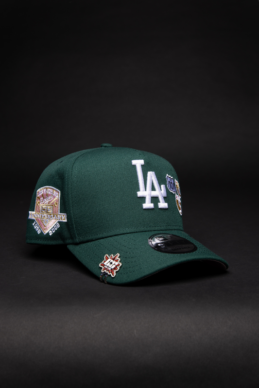 NEW ERA 9FIFTY A-FRAME FOREST GREEN LOS ANGELES DODGERS SNAPBACK W/ INTERSTATE + 50TH ANNIVERSARY SIDE PATCH