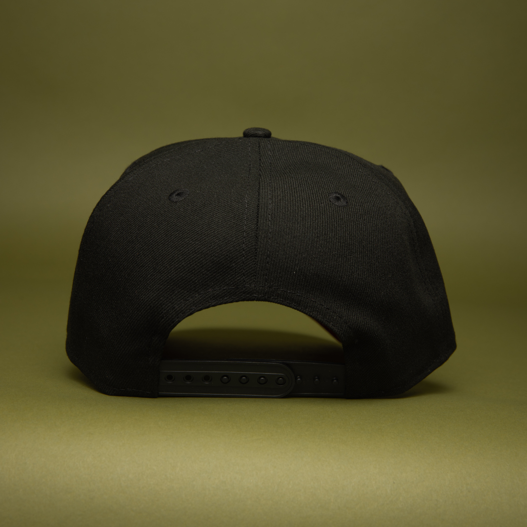 NEW ERA 9FIFTY A-FRAME BLACKED OUT ANAHEIM ANGELS SNAPBACK W/ 25TH ANNIVERSARY SIDE PATCH