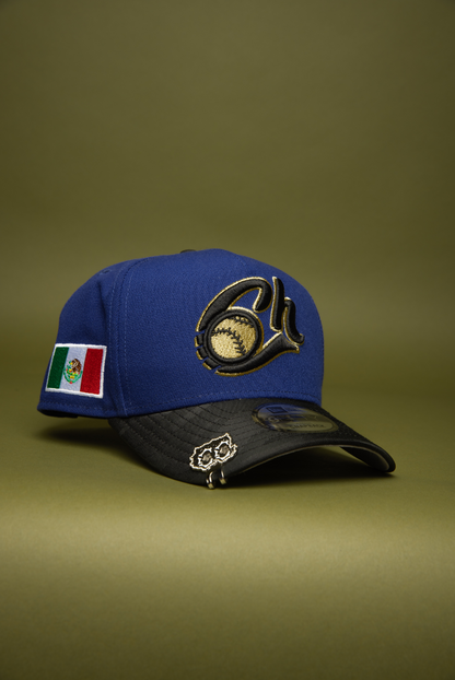 NEW ERA 9FIFTY A-FRAME DARK BLUE/BLACK CAMO CHARROS DE JALISCO SNAPBACK W/ MEXICO FLAG SIDE PATCH
