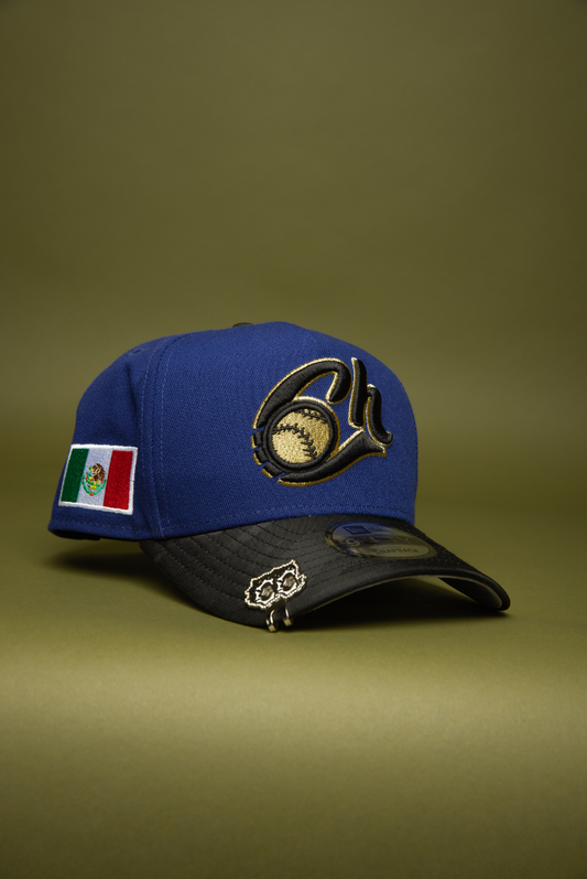 NEW ERA 9FIFTY A-FRAME DARK BLUE/BLACK CAMO CHARROS DE JALISCO SNAPBACK W/ MEXICO FLAG SIDE PATCH