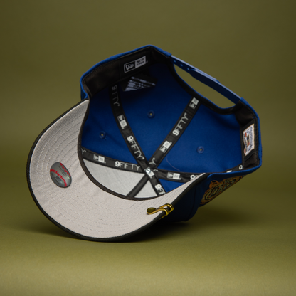 NEW ERA 9FIFTY A-FRAME BLUE/BLACK ANAHEIM ANGELS SNAPBACK W/ 50TH ANNIVERSARY SIDE PATCH