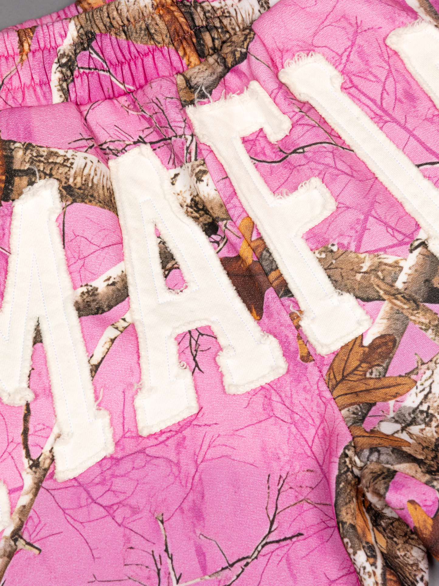 CAP CITY X SHORELINE MAFIA PINK CAMO SHORTS - UNISEX