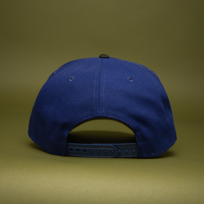 NEW ERA 9FIFTY A-FRAME DARK BLUE/BLACK CAMO CHARROS DE JALISCO SNAPBACK W/ MEXICO FLAG SIDE PATCH