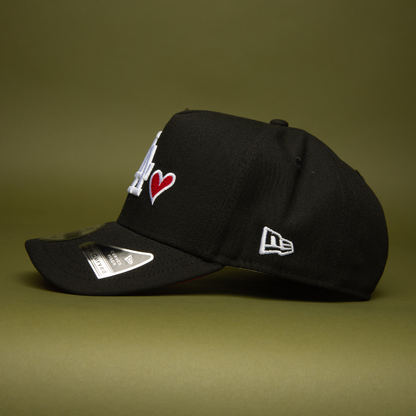NEW ERA 9FIFTY A-FRAME BLACK LOS ANGELES DODGERS SNAPBACK W/ RED HEART + 50TH ANNIVERSARY SIDE PATCH