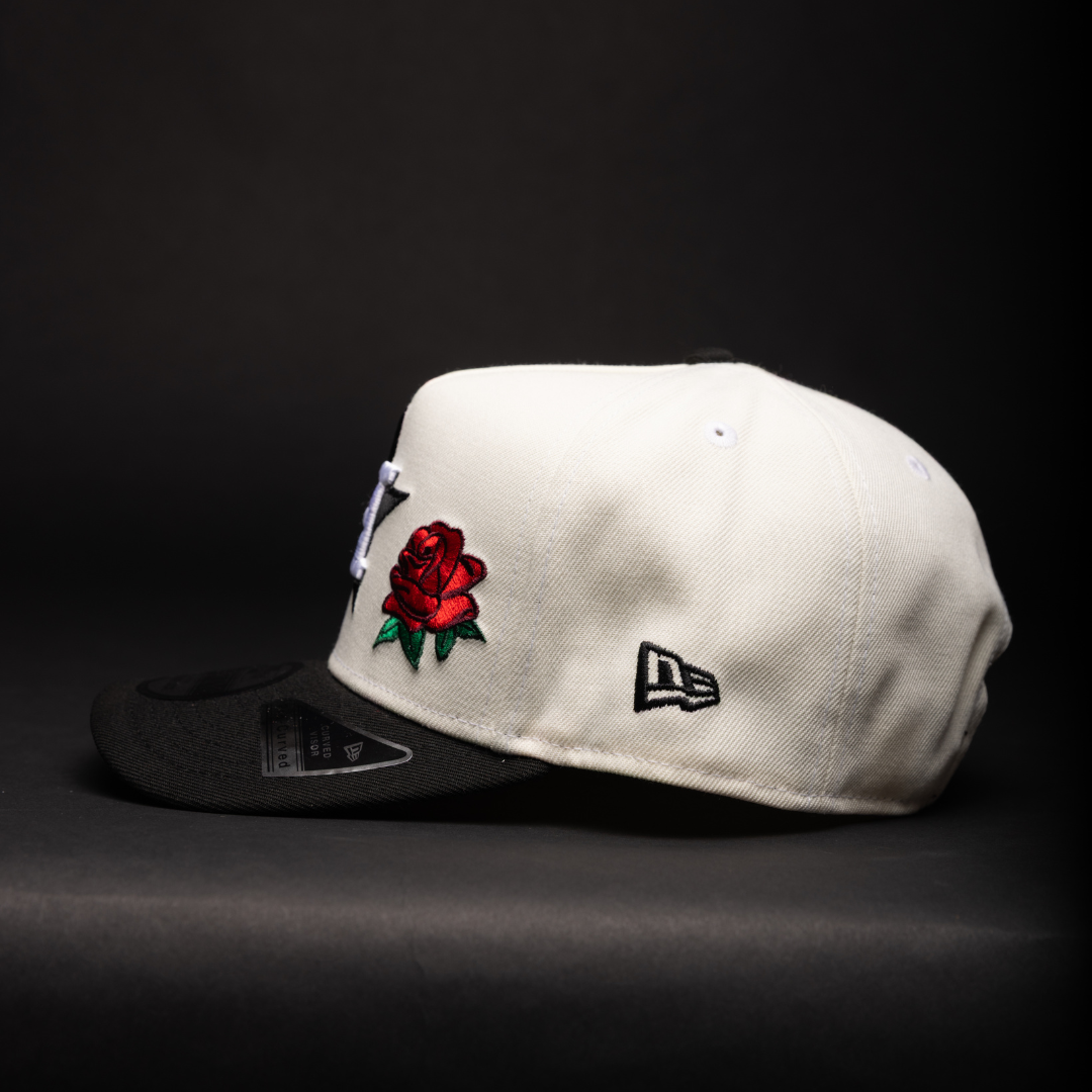NEW ERA 9FIFTY A-FRAME CHROME/BLACK HOUSTON ASTROS SNAPBACK W/ RED ROSE + "35 GREAT YEARS" SIDE PATCH