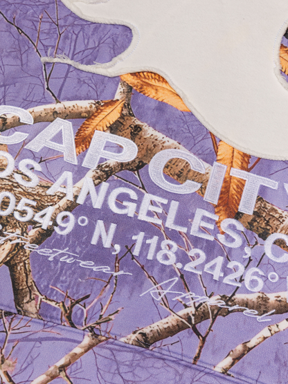 CAP CITY X SHORELINE MAFIA LAVENDER CAMO ZIP UP HOODIE -UNISEX