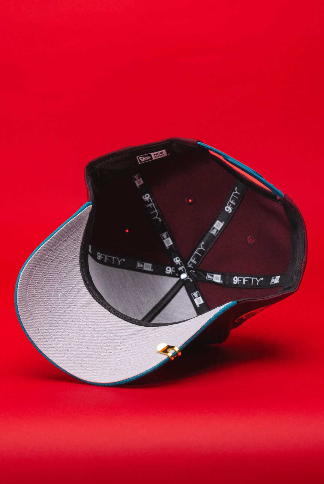 NEW ERA 9FIFTY A-FRAME BURGUNDY/TURQUOISE ANAHEIM DUCKS SNAPBACK W/ "DUCKS" SIDE PATCH