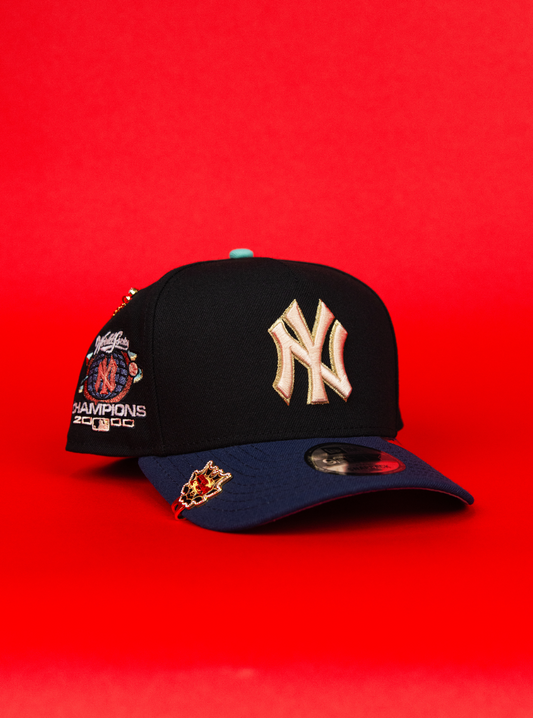 NEW ERA 9FIFTY A-FRAME BLACK/ NAVY NEW YORK YANKEES SNAPBACK W/ 2000 WORLD SERIES CHAMPIONS SIDE PATCH