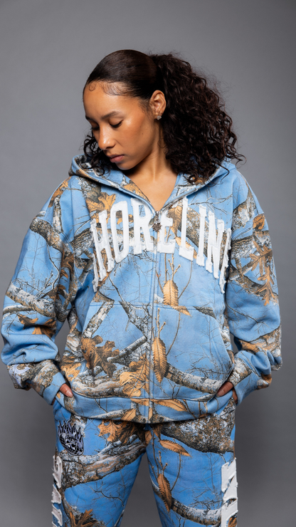 CAP CITY X SHORELINE MAFIA SKY BLUE ZIP UP CAMO HOODIE -UNISEX