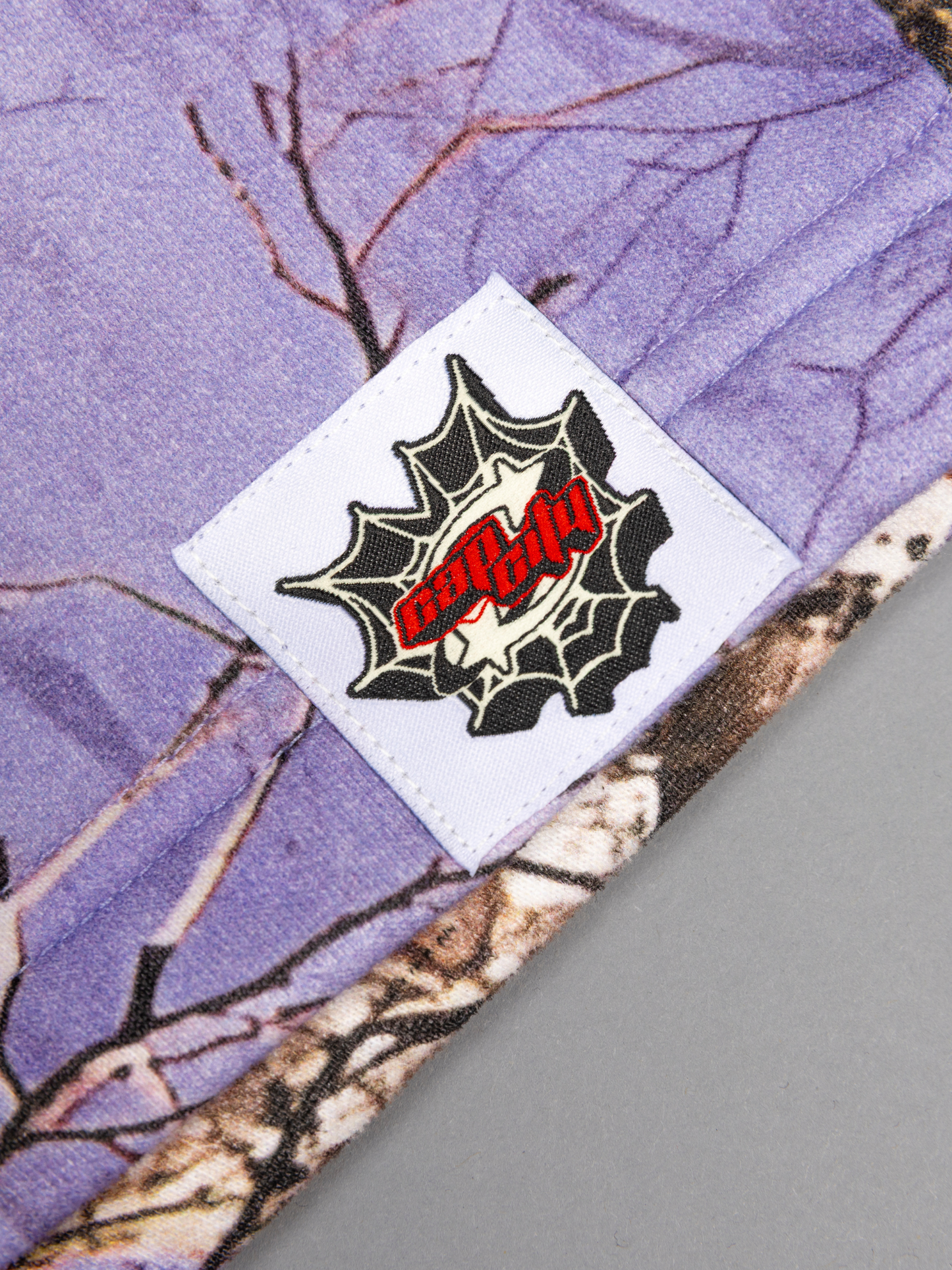 CAP CITY X SHORELINE MAFIA LAVENDER CAMO SHORTS - UNISEX