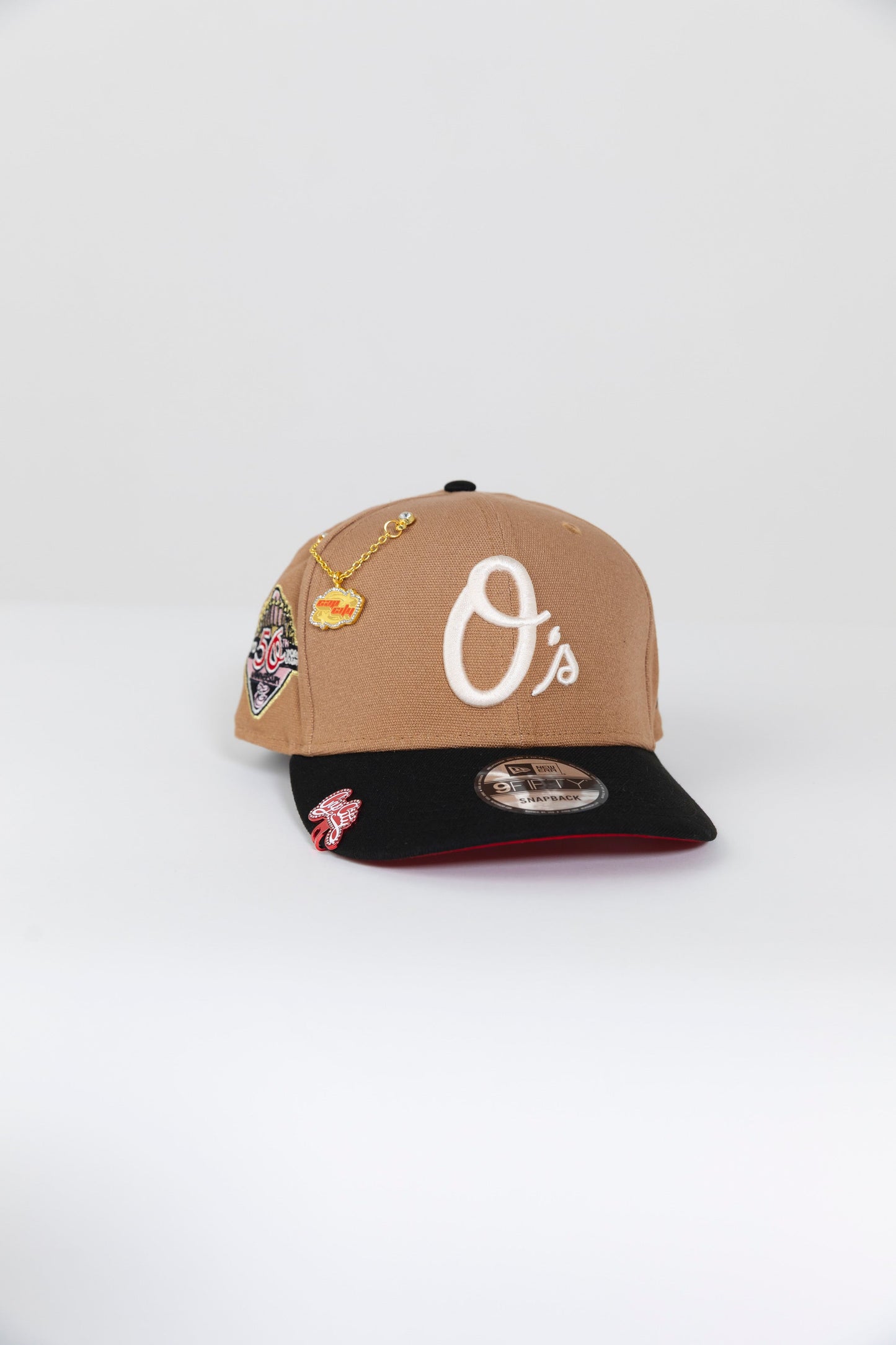 NEW ERA EXCLUSIVE 9FIFTY TAN/ BLACK BALTIMORE ORIOLES SNAPBACK W/ 50TH ANNIVERSARY PATCH