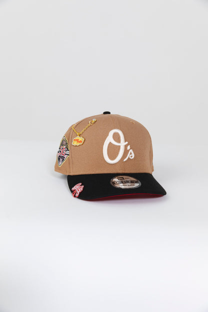 NEW ERA EXCLUSIVE 9FIFTY TAN/ BLACK BALTIMORE ORIOLES SNAPBACK W/ 50TH ANNIVERSARY PATCH