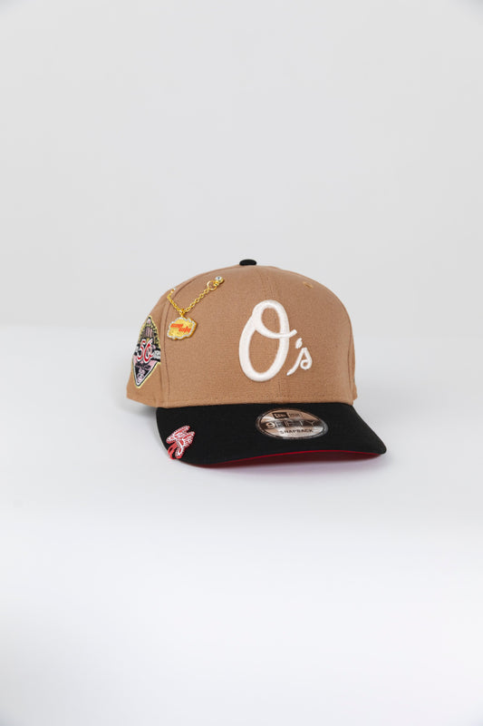 NEW ERA EXCLUSIVE 9FIFTY TAN/ BLACK BALTIMORE ORIOLES SNAPBACK W/ 50TH ANNIVERSARY PATCH