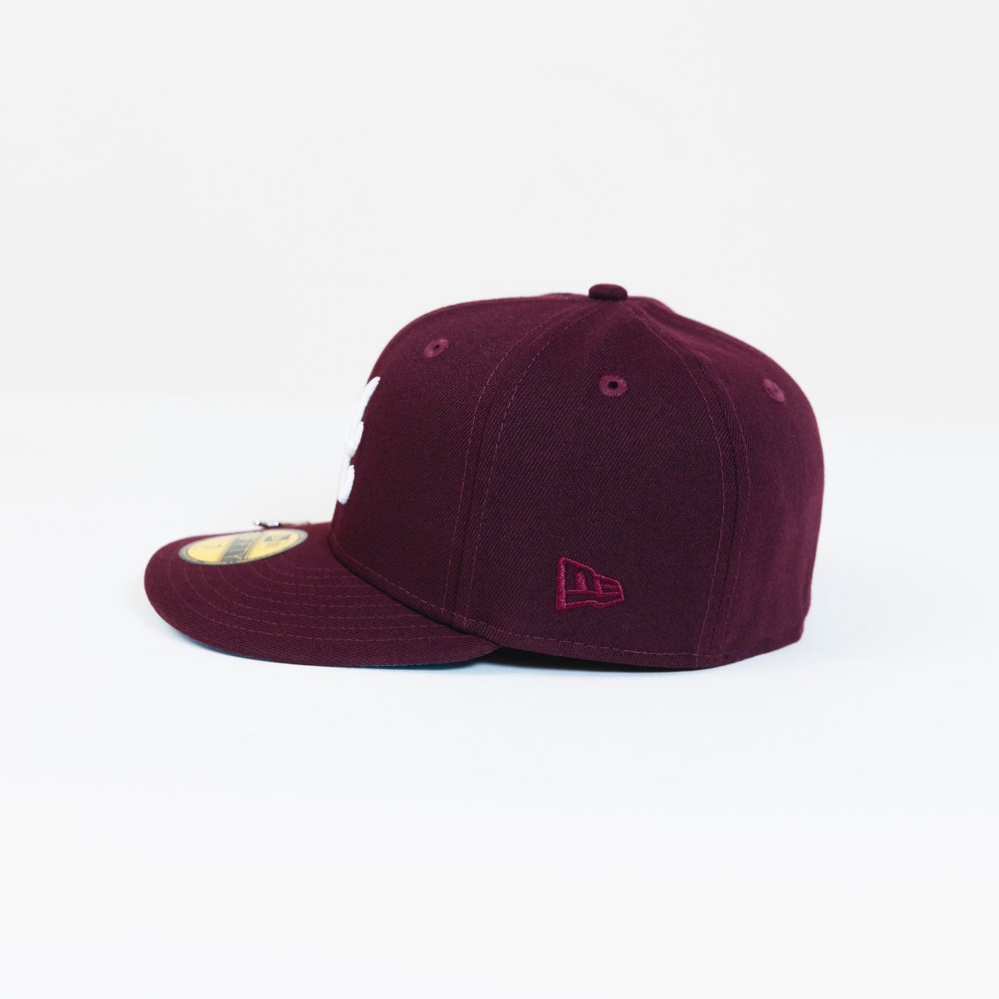 NEW ERA 59FIFTY BURGUNDY ATLANTA BRAVES W/ 1995 WORLD SERIES SIDE PATCH
