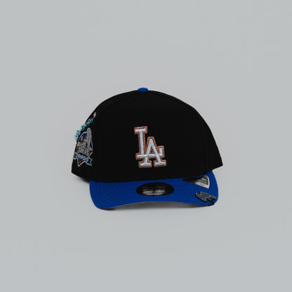NEW ERA EXCLUSIVE 9FIFTY A-FRAME BLACK/ BLUE LOS ANGELES DODGERS SNAPBACK W/ 2024 WORLD SERIES CHAMPIONS SIDE PATCH