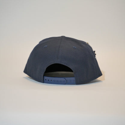 NEW ERA EXCLUSIVE 9FIFTY NAVY ATLANTA BRAVES SNAPBACK W/ 2021 WORLD SERIES SIDE PATCH