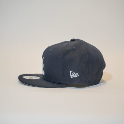 NEW ERA EXCLUSIVE 9FIFTY NAVY ATLANTA BRAVES SNAPBACK W/ 2021 WORLD SERIES SIDE PATCH