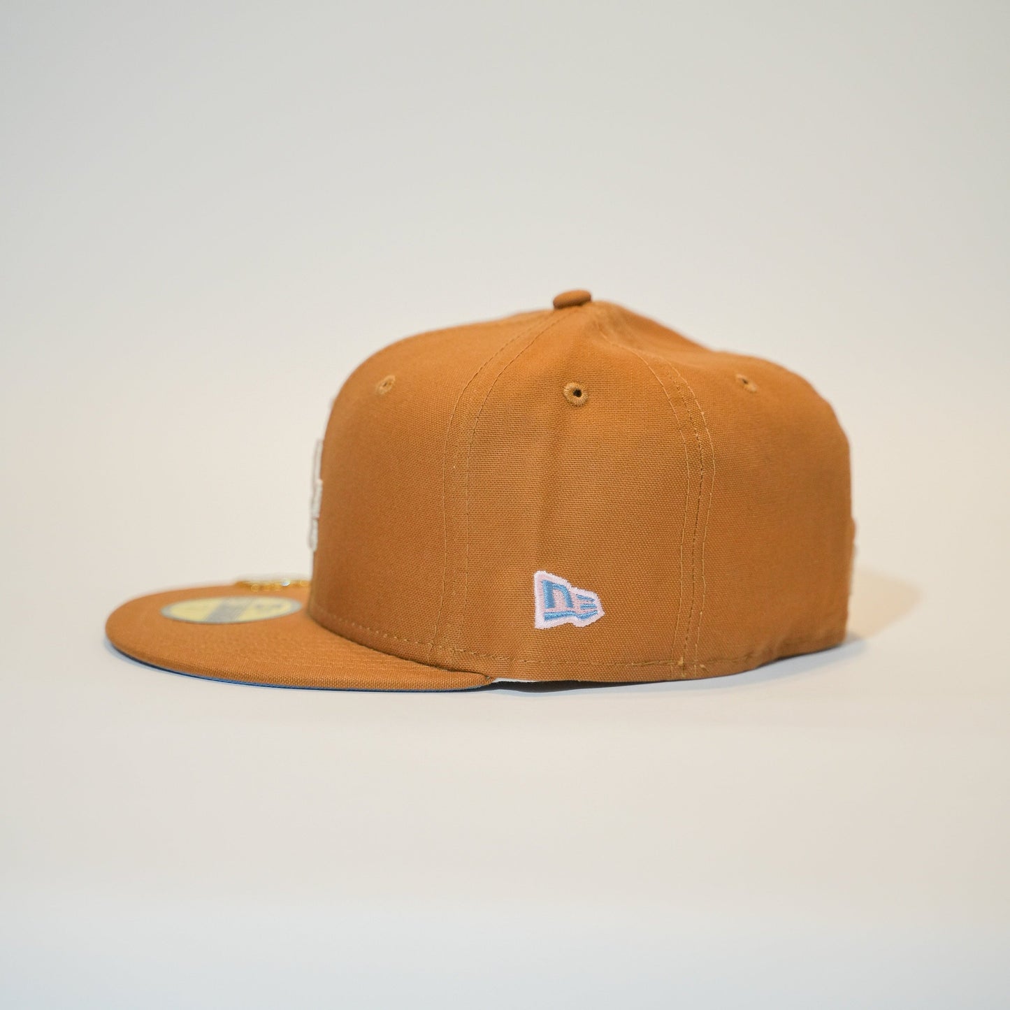 NEW ERA EXCLUSIVE 59FIFTY BRONZE LOS ANGELES DODGERS W/ 50TH ANNIVERSRAY SIDE PATCH