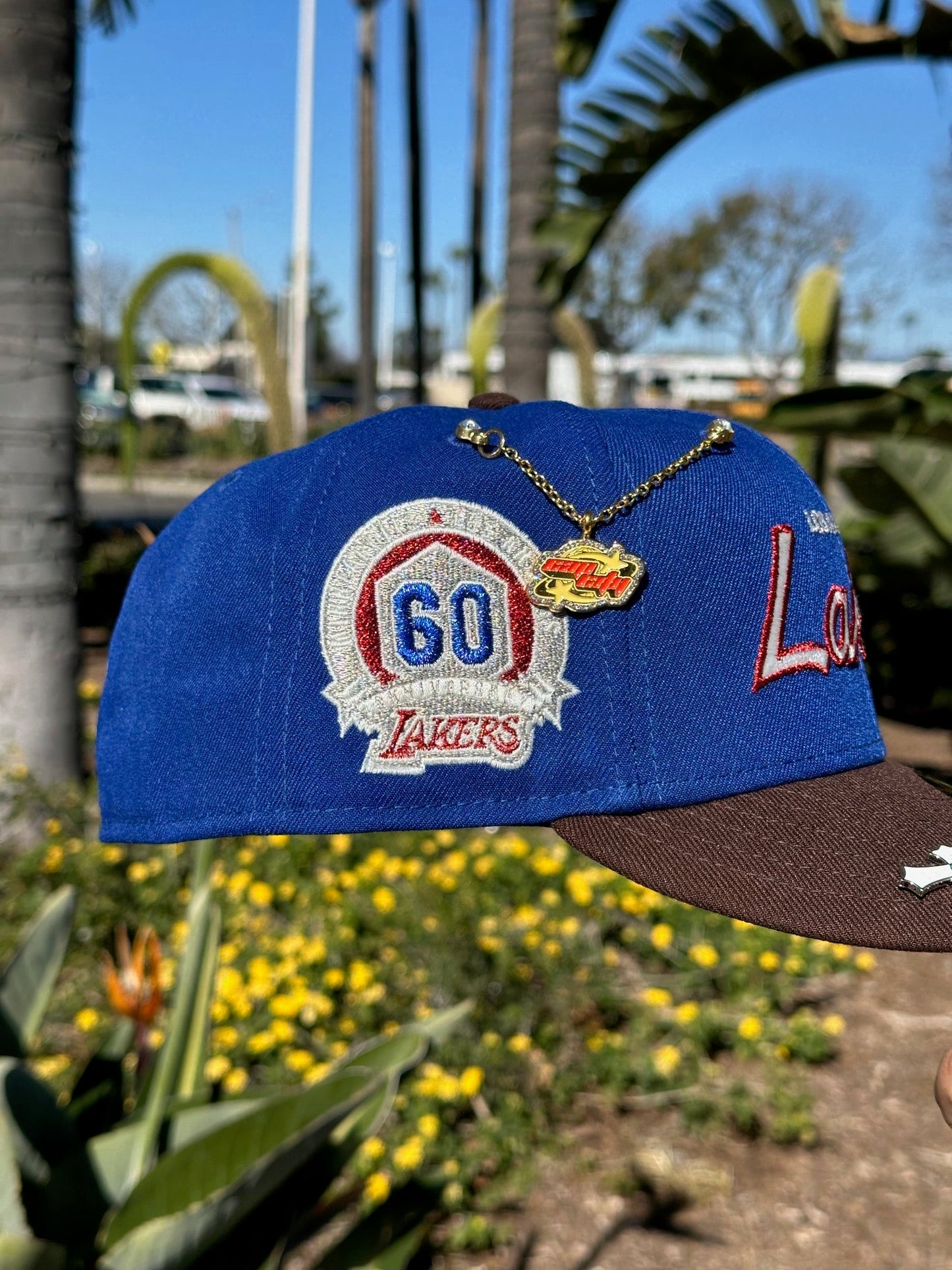 NEW ERA EXCLUSIVE 59FIFTY BLUE/WALNUT LOS ANGELES LAKERS SCRIPT W/ 60TH ANNIVERSARY SIDE PATCH
