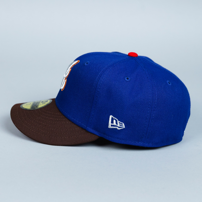 NEW ERA EXCLUSIVE 59FIFTY DARK BLUE/ BROWN ATLANTA BRAVES W/ 1999 WORLD SERIES SIDE PATCH