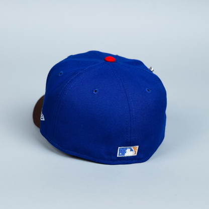 NEW ERA EXCLUSIVE 59FIFTY DARK BLUE/ BROWN ATLANTA BRAVES W/ 1999 WORLD SERIES SIDE PATCH