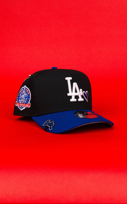 NEW ERA 9FIFTY A-FRAME BLACK/ BLUE LOS ANGELES DODGERS SNAPBACK W/ BLUE HEART + 60TH ANNIVERSARY SIDE PATCH