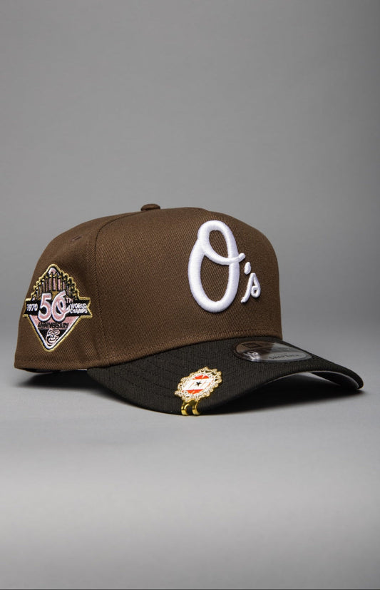 NEW ERA 9FIFTY A-FRAME BROWN/BLACK BALTIMORE ORIOLES SNAPBACK W/ 50TH ANNIVERSARY SIDE PATCH