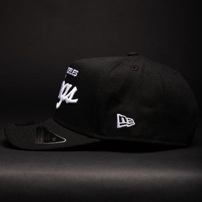 NEW ERA 9FIFTY A-FRAME BLACK LOS ANGELES KINGS SCRIPT SNAPBACK W/ 2012 NHL CHAMPIONS SIDE PATCH