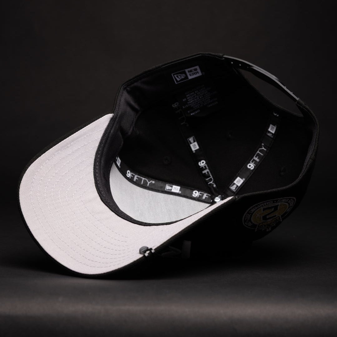 NEW ERA 9FIFTY A-FRAME BLACK LOS ANGELES KINGS SCRIPT SNAPBACK W/ 2012 NHL CHAMPIONS SIDE PATCH