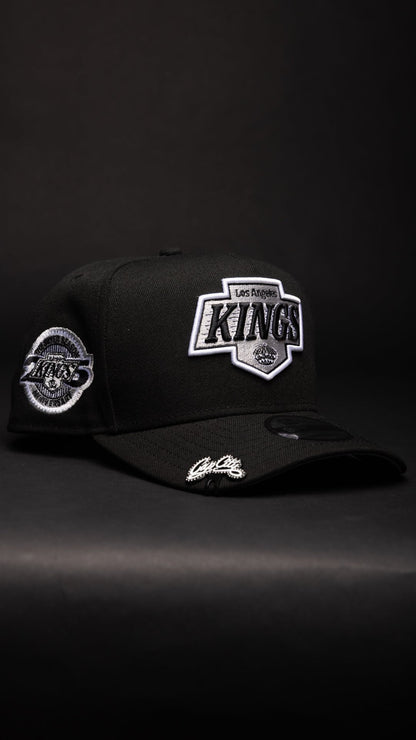 NEW ERA 9FIFTY A-FRAME BLACK LOS ANGELES KINGS SNAPBACK W/ 25TH ANNIVERSARY SIDE PATCH
