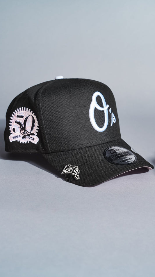 NEW ERA 9FIFTY A-FRAME BLACK BALTIMORE ORIOLES SNAPBACK W/ 50TH ANNIVERSARY SIDE PATCH