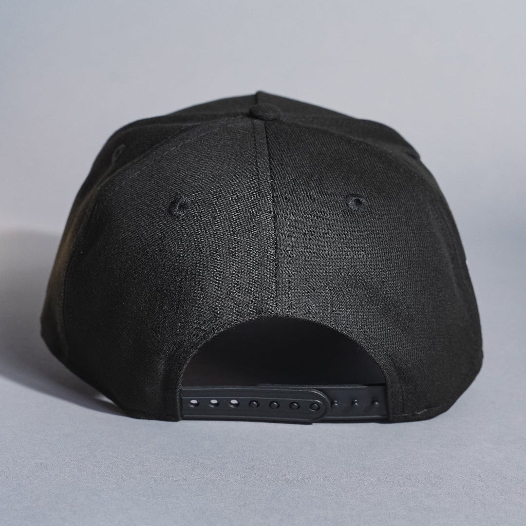 NEW ERA 9FIFTY A-FRAME BLACKED OUT LAS VEGAS RAIDERS SNAPBACK W/ 50TH ANNIVERSARY SIDE PATCH