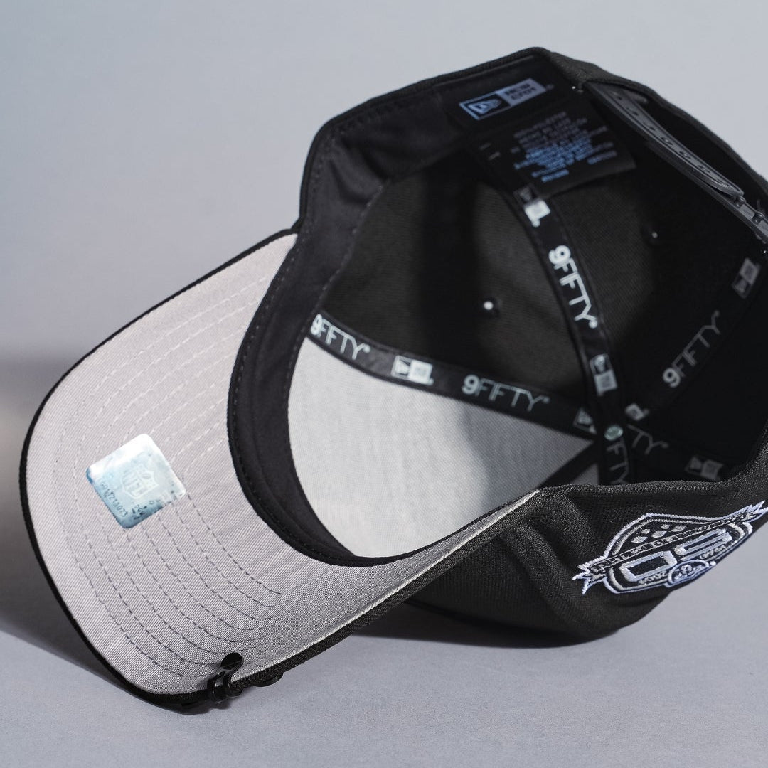NEW ERA 9FIFTY A-FRAME BLACKED OUT LAS VEGAS RAIDERS SNAPBACK W/ 50TH ANNIVERSARY SIDE PATCH