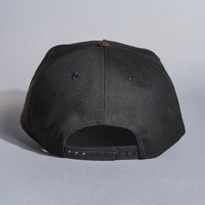 NEW ERA 9FIFTY A-FRAME BLACK/BROWN LOS ANGELES DODGERS SNAPBACK W/ WORLD SERIES CHAMPIONS SIDE PATCH