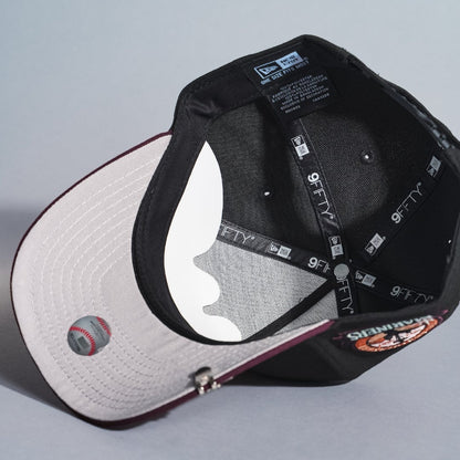 NEW ERA 9FIFTY A-FRAME BLACK/BURGUNDY SEATTLE MARINERS SNAPBACK W/ ANNIVERSARY SIDE PATCH