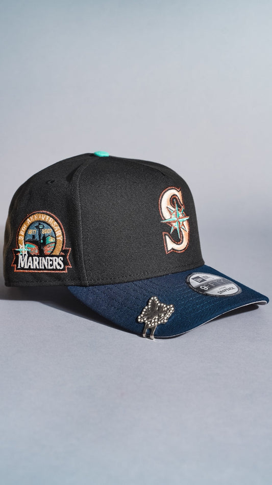 NEW ERA 9FIFTY A-FRAME BLACK/NAVY SEATTLE MARINERS SNAPBACK W/ ANNIVERSARY SIDE PATCH