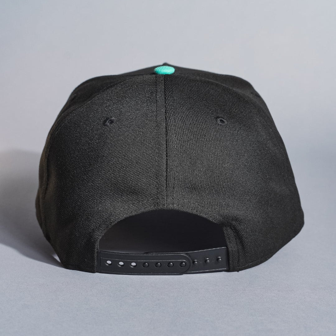 NEW ERA 9FIFTY A-FRAME BLACK/NAVY SEATTLE MARINERS SNAPBACK W/ ANNIVERSARY SIDE PATCH