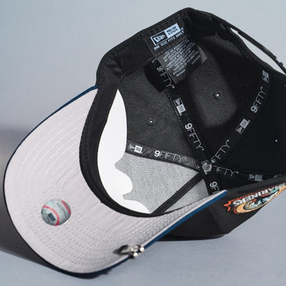 NEW ERA 9FIFTY A-FRAME BLACK/NAVY SEATTLE MARINERS SNAPBACK W/ ANNIVERSARY SIDE PATCH