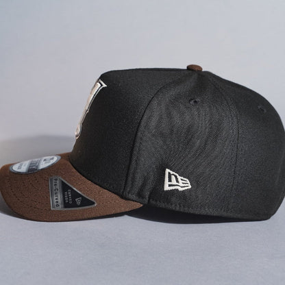 NEW ERA 9FIFTY A-FRAME BLACK/BROWN UPSIDE DOWN ANAHEIM ANGELS SNAPBACK W/ 50TH ANNIVERSARY SIDE PATCH