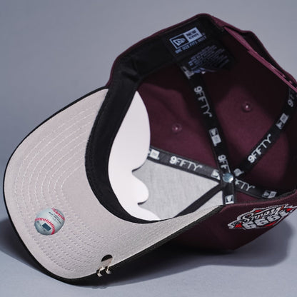 NEW ERA 9FIFTY A-FRAME BURGUNDY/BLACK ATLANTA BRAVES SNAPBACK W/ 1999 WORLD SERIES SIDE PATCH